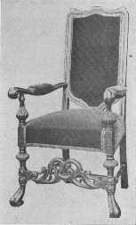 Reproduction of chair showing the transition between the
time of Charles II and William and Mary. The carved strut remains but
the back is lower and simpler.