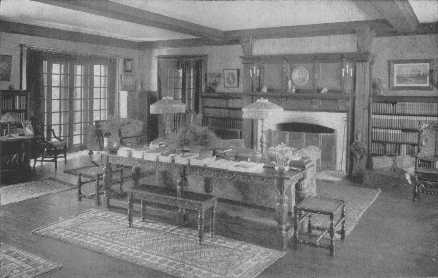 The arrangement of sofa and table are excellent, but
there should be other centers of interest in the room. As it is, this
room just misses its aim, and is neither a strict period room nor a
really comfortable modern one.