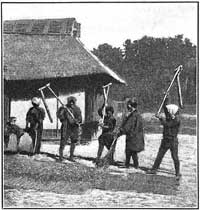 FIG. 96.&mdash;Separating rice grains by flailing.