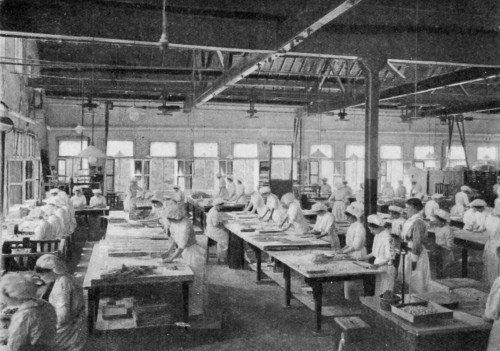 A CONFECTIONERY ROOM AT MESSRS. CADBURY'S WORKS AT BOURNVILLE.
Cutting almond paste by hand moulds.