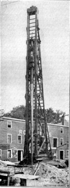 Fig. 49.&mdash;Pile Driver Rigged for Constructing Raymond
Concrete Piles.