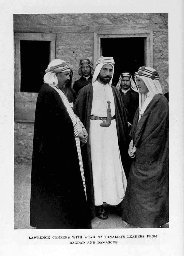 Photograph: LAWRENCE CONFERS WITH ARAB NATIONALISTS
LEADERS FROM BAGDAD AND DAMASCUS
