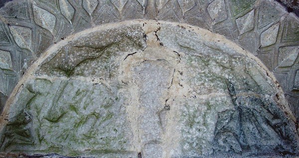 View of the inside the porch,& very eroded sculpture. 